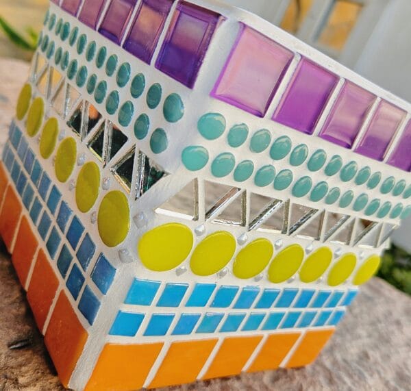 Decorative colourful mosaic plant pot.