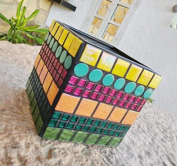 Decorative colourful mosaic plant pot.