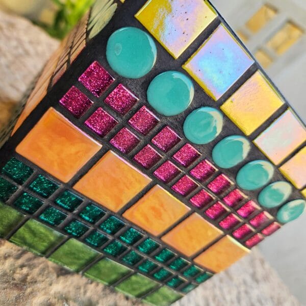 Decorative colourful mosaic plant pot.