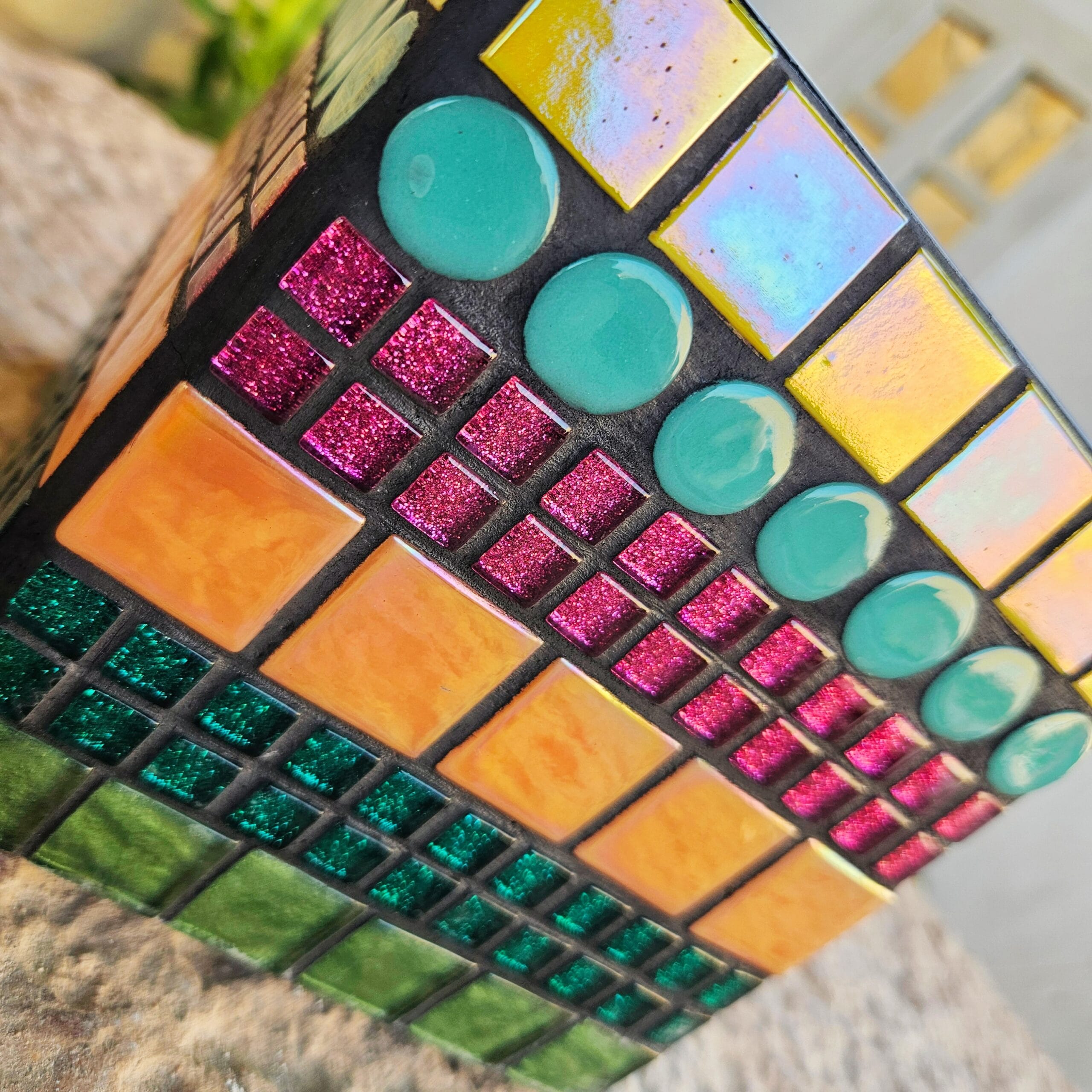 Decorative colourful mosaic plant pot.