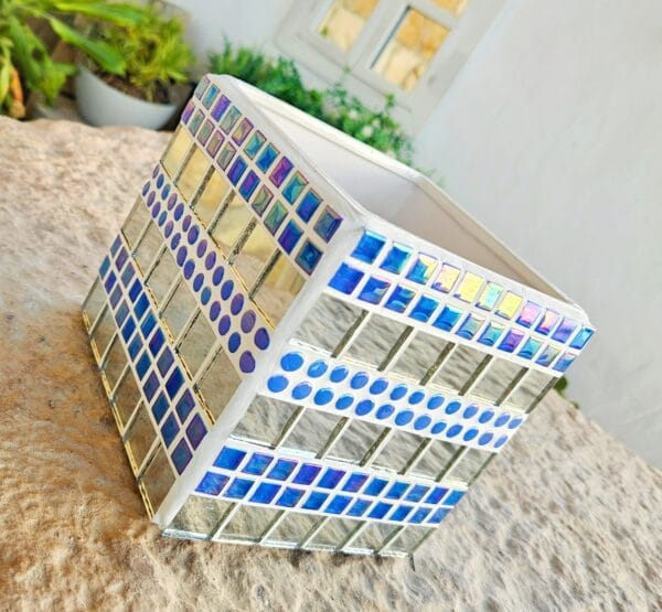 Decorative blue mosaic plant pot.
