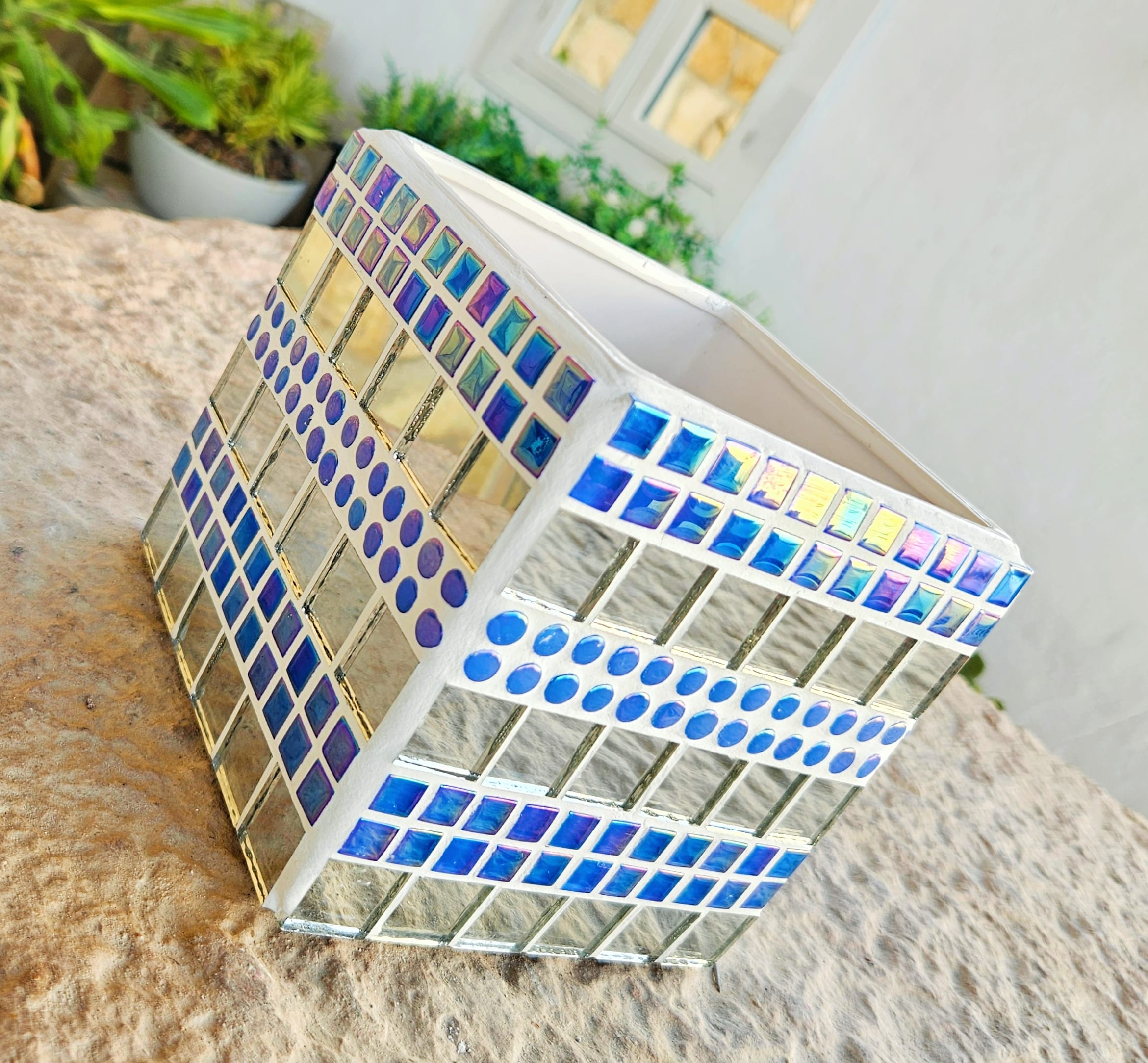 Decorative blue mosaic plant pot.