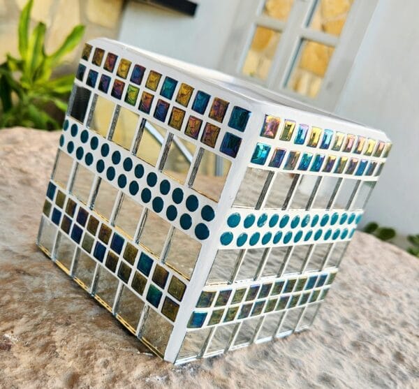 Decorative turquoise mosaic plant pot.