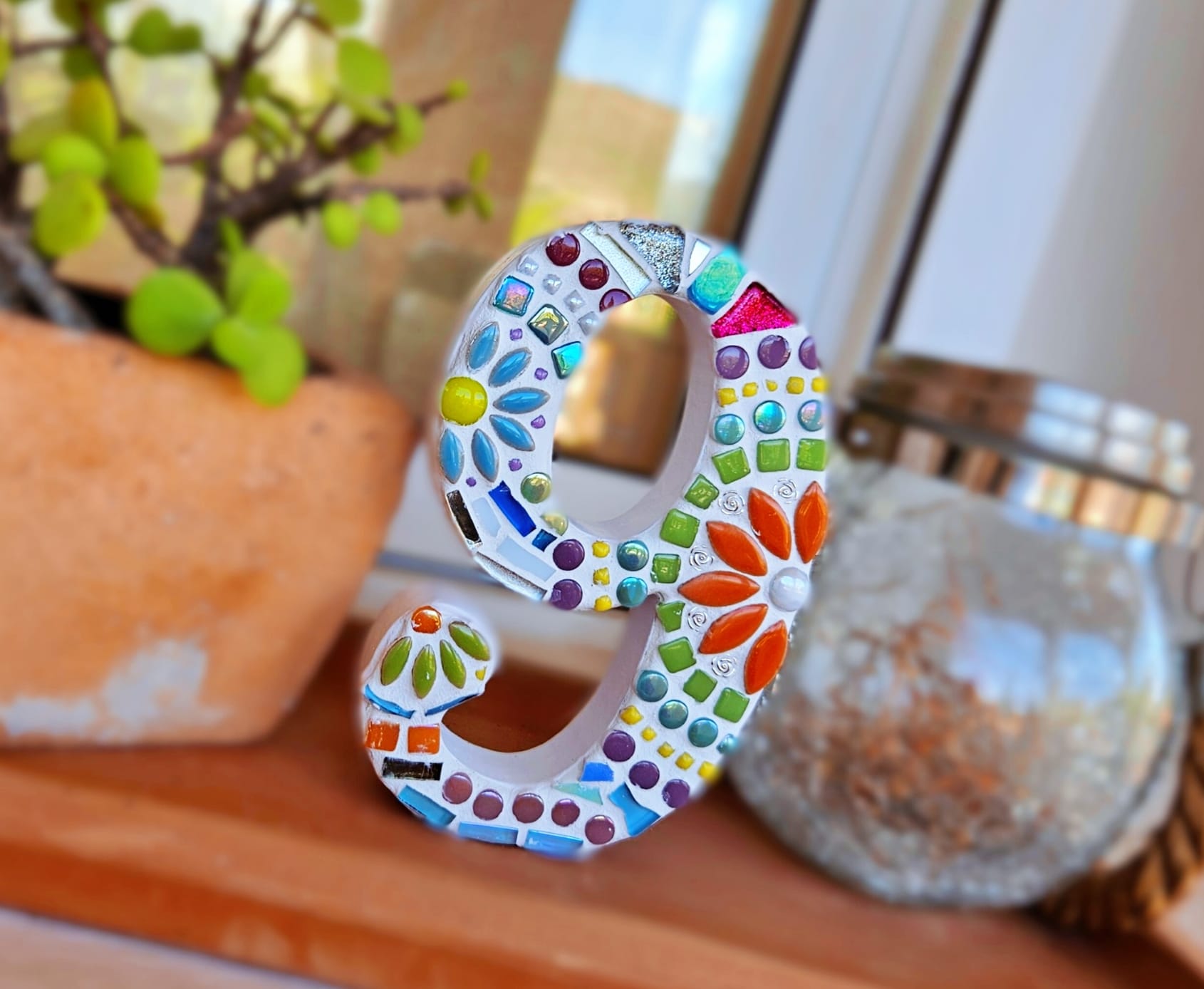 Decorative mosaic number 9.