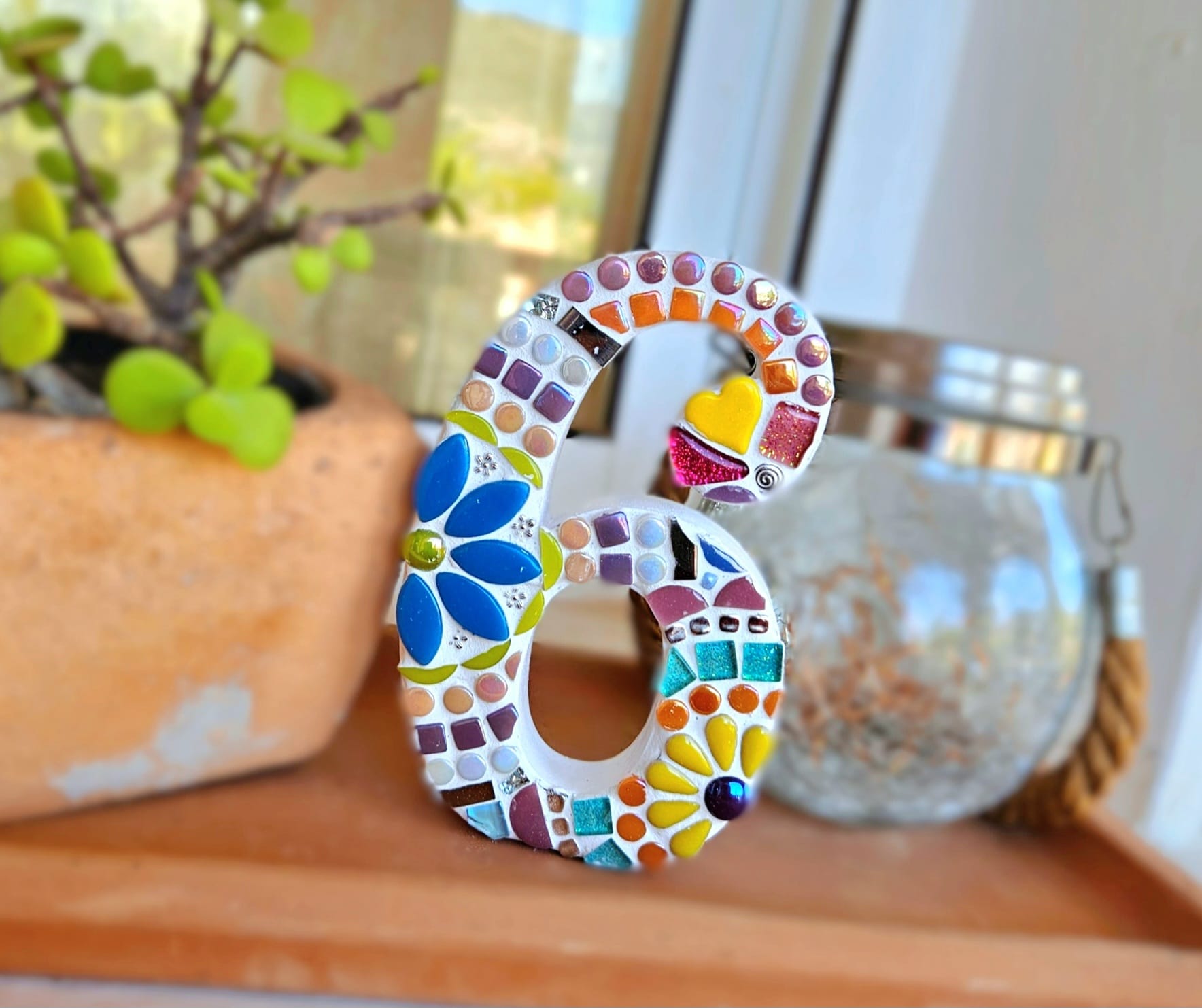 Decorative mosaic number 6.