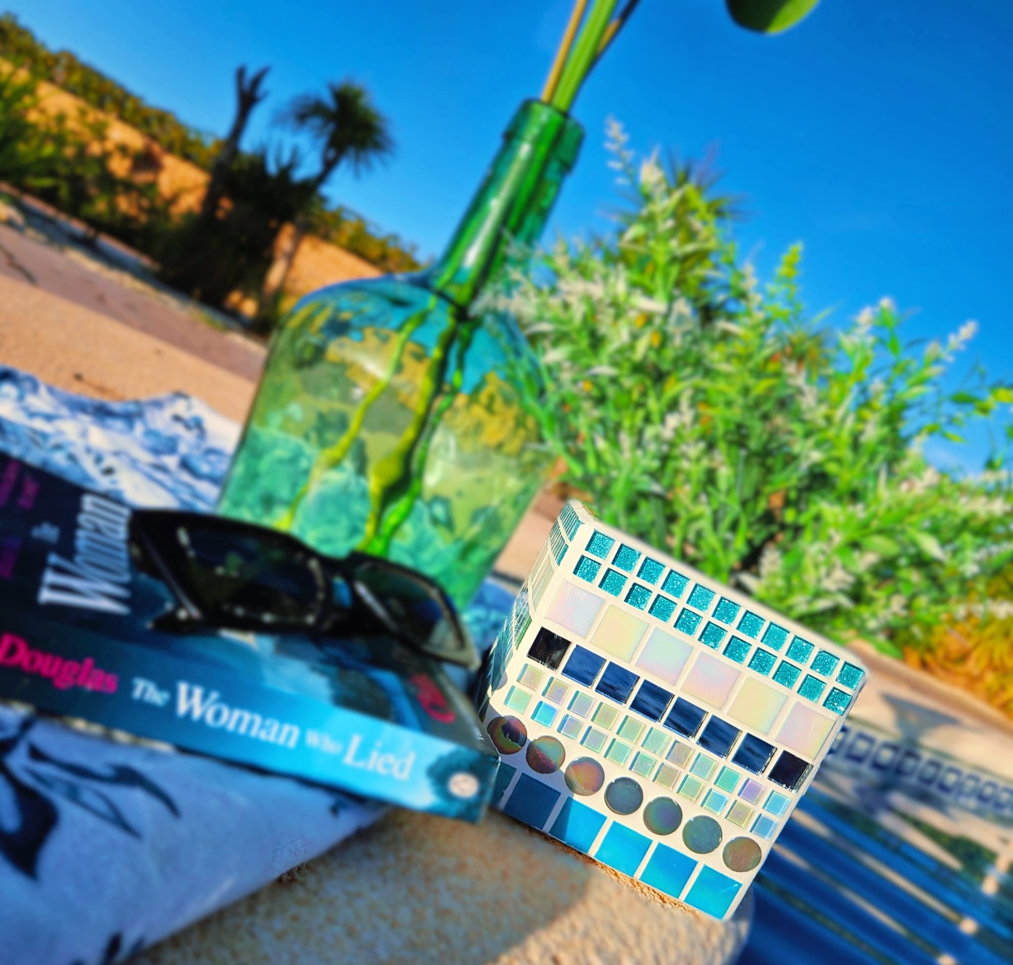 Decorative blue and white mosaic plant pot.