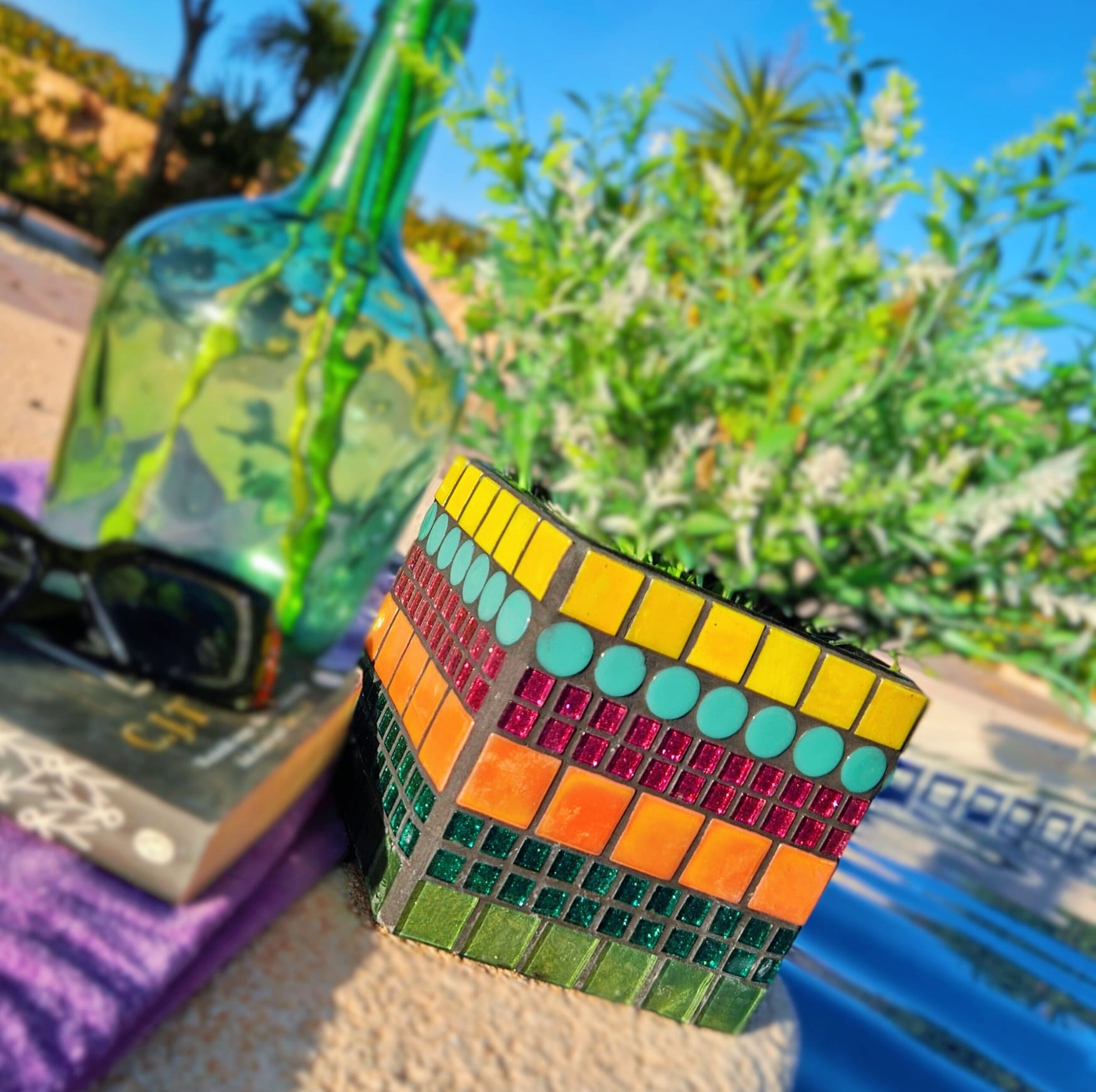 Decorative colourful mosaic plant pot.