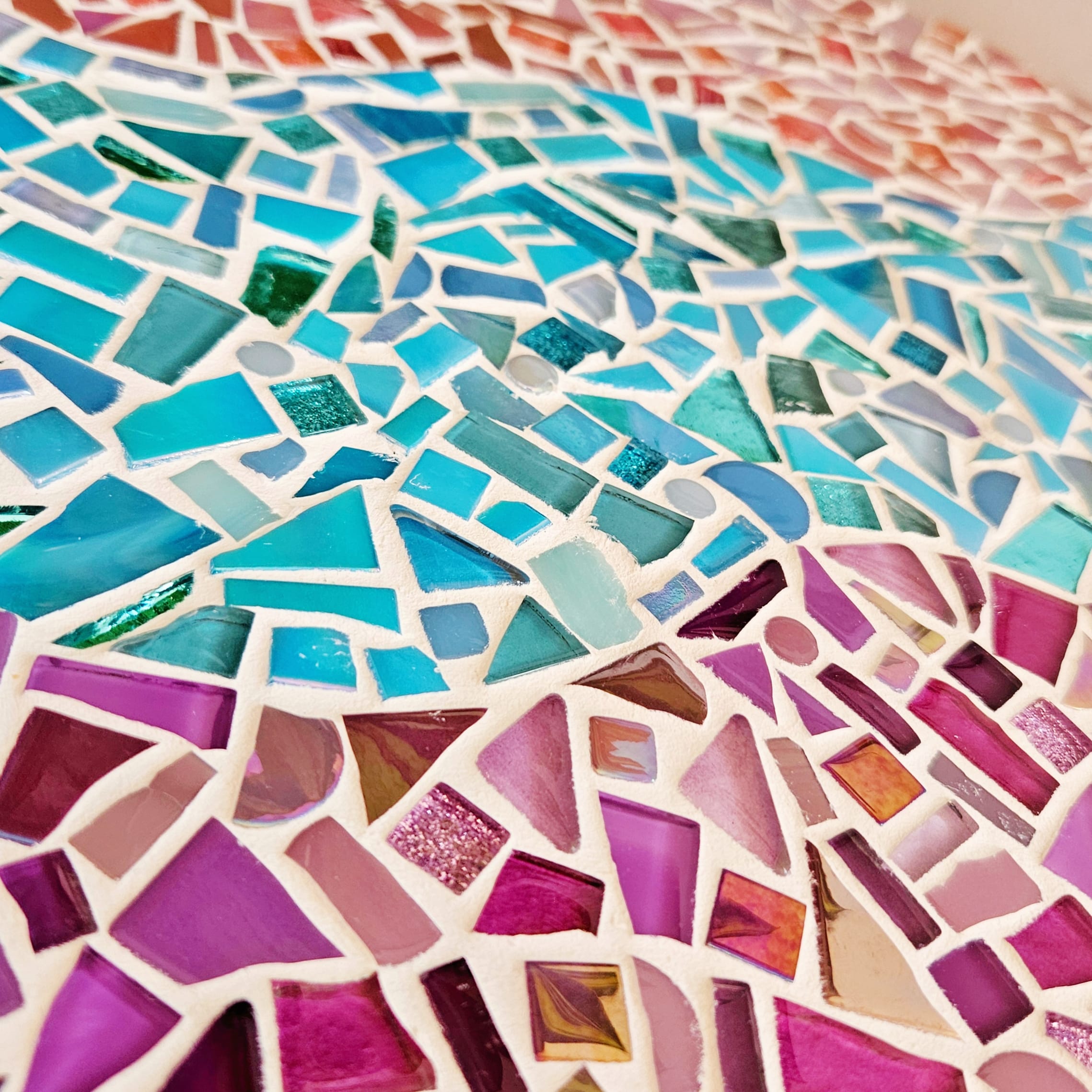 Closeup of colourful mosaic table.