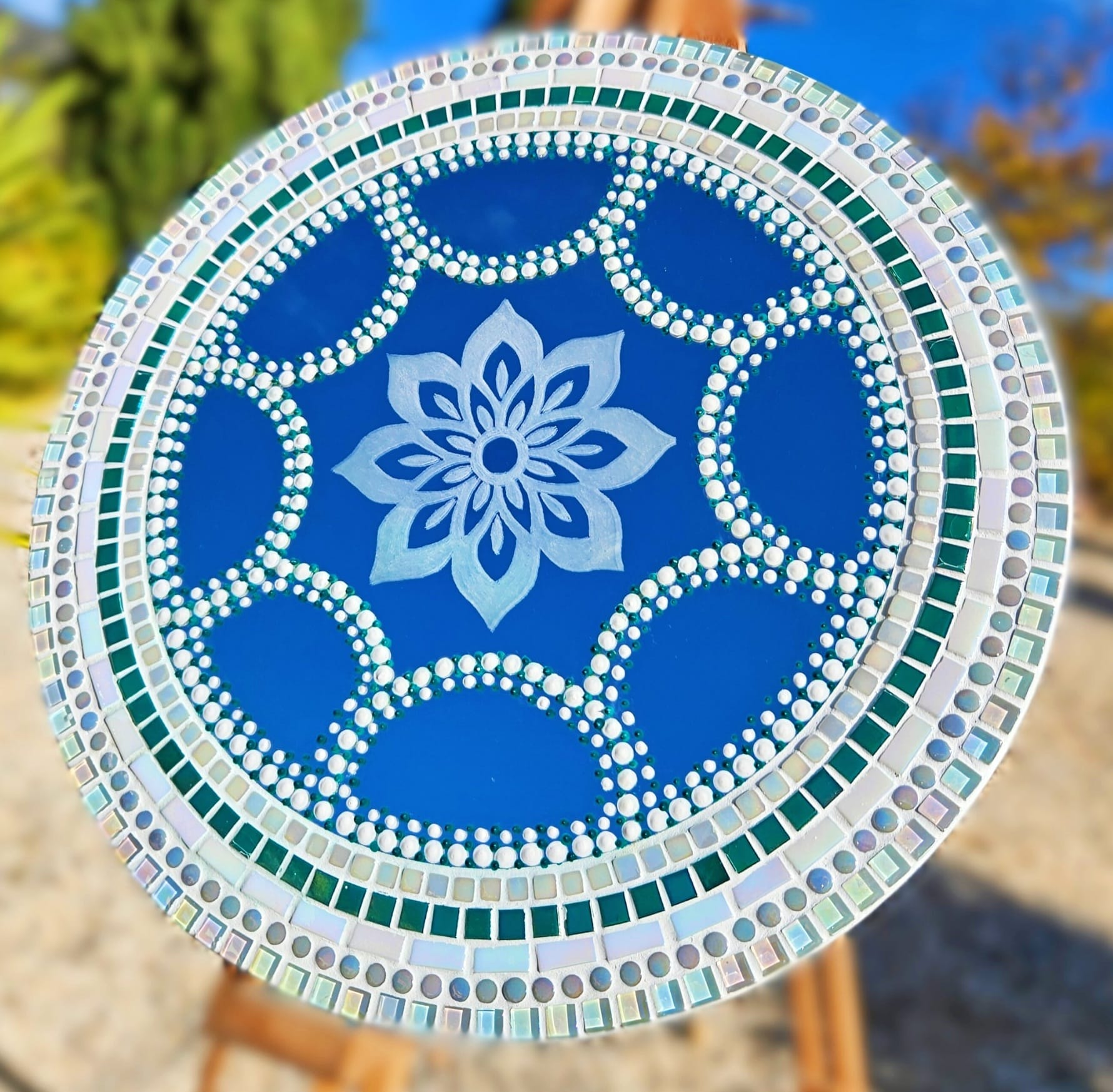 Mosaic mirror with dot work and etched mandala.